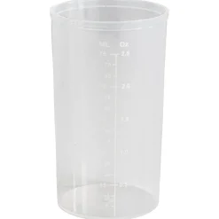 Pot avec pinceau de cuisine et verre doseur