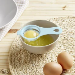 Séparateur blanc d'oeuf plastique bleu ou rose