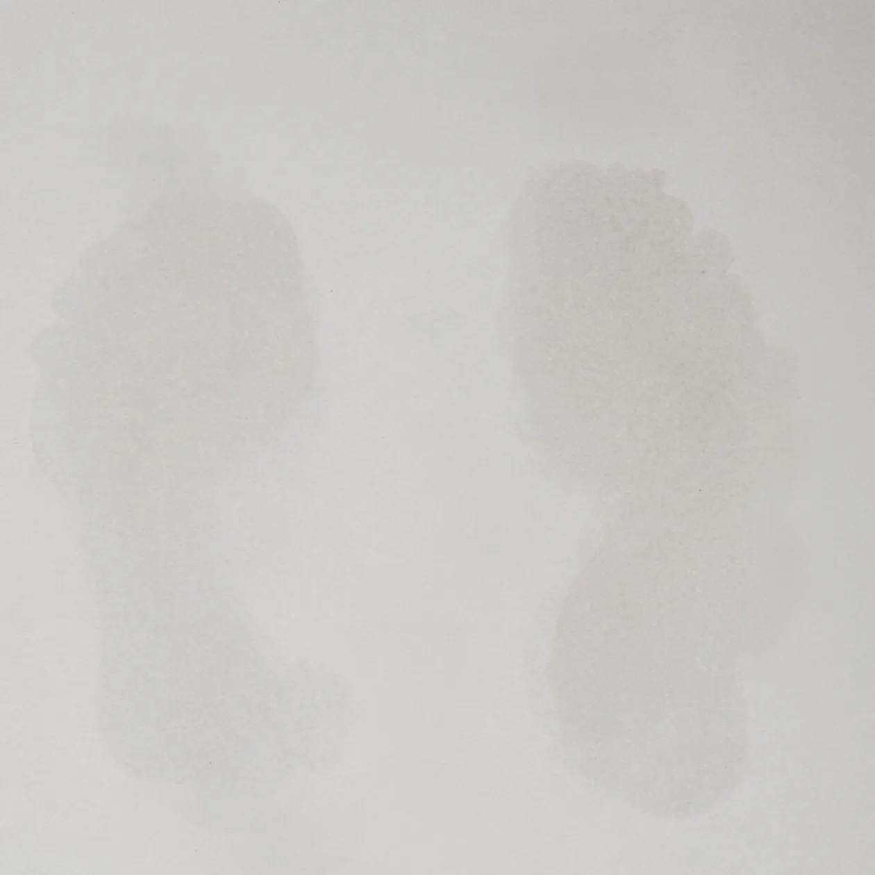 Tapis de salle de bain blanc magique